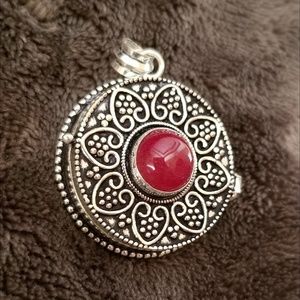 Silver & ruby poison pendant locket round opens